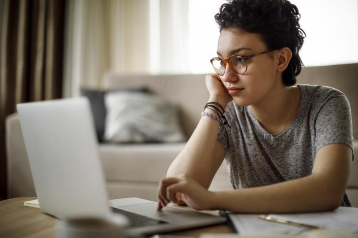 Girl sitting in front of a computer