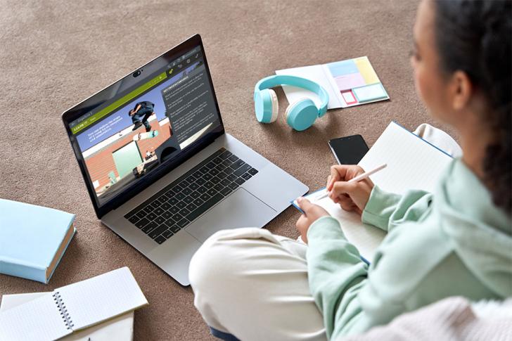 Teen school girl learning online from home